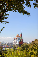 Fototapeta na wymiar Vodovzvodnaya tower and The Cathedral of Christ the Saviour