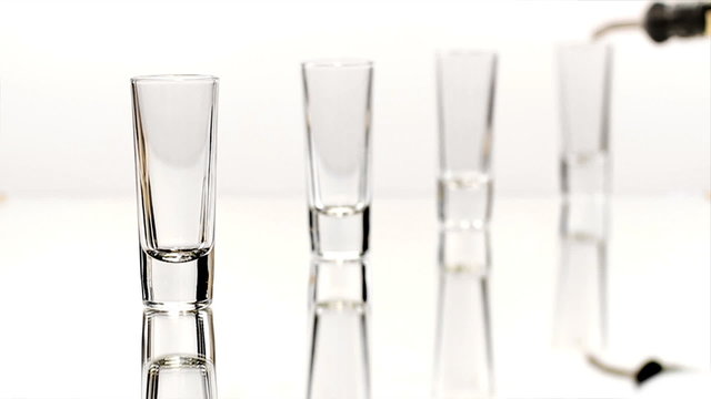 Row of Four Shot Glasses