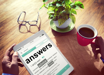 Man Reading the Definition of Answers