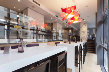 Interior of a corridor with passenger lift and marble stairs 
