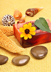 Handmade natural soap, shells and pebbles