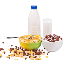 bowls of corn flakes with milk.