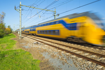 Fototapeta premium Passenger train moving at high speed