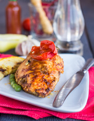 chicken fillet baked in spices and tomato sauce