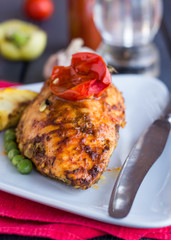 chicken fillet baked in spices and tomato sauce