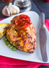 chicken fillet baked in spices and tomato sauce