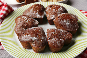 Homemade chocolate cupcakes on table