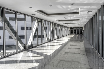 glazed passage between buildings in simple urban style