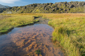 Scenic view of colored hot river in Landmannalaugar NP, Iceland. © 1tomm