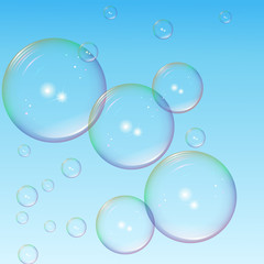 large and small colorful bubbles with highlights