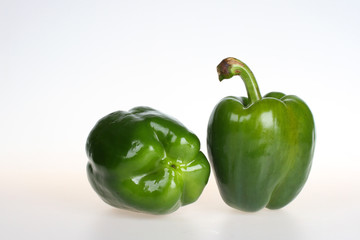 Two green bell pepper