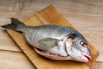 Sea bream on a chopping board