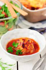 Pork Meatballs baked with Tomato Sauce and Cheese