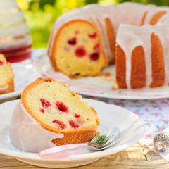 A Slice of Lemon and Caraway Seed Bundt Cake with Raspberries