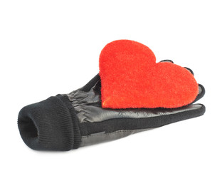 Red heart in black leather gloves