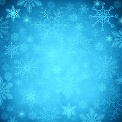 Blue shiny Christmas background with snowflakes
