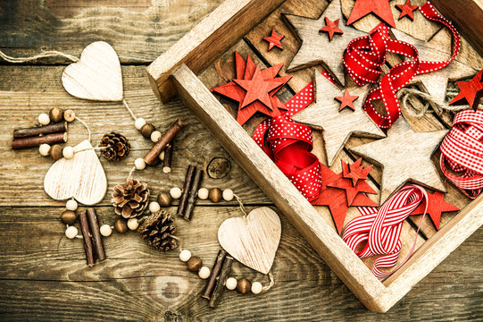 christmas decorations wooden stars and red ribbons. retro style