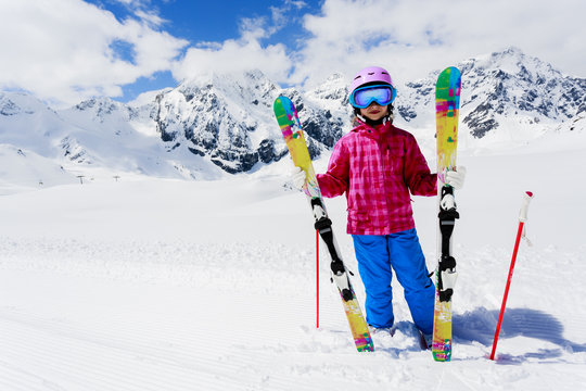 Ski, winter fun -  skier girl enjoying ski vacation