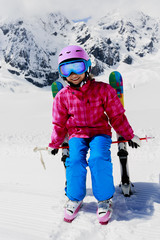 Fototapeta na wymiar Ski, winter fun, lovely skier girl enjoying ski vacation