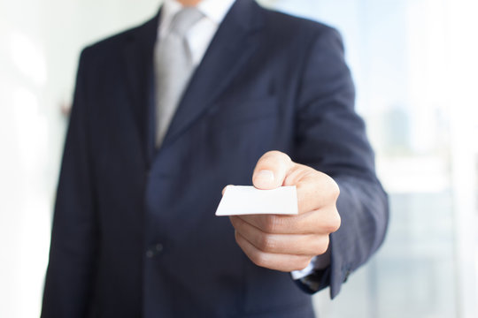 Businessman Giving A Business Card