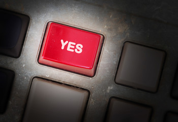 Red button on a dirty old panel