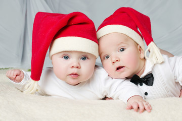 cute babies with santa hats