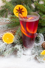 mulled wine with decorated christmas tree