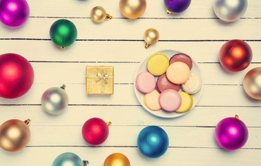 Naklejka na ściany i meble Macaron and gift near christmas toys.
