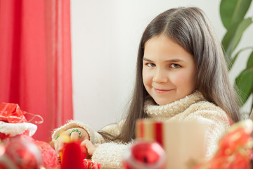 Happy young family getting ready for the Advent, Christmas holid