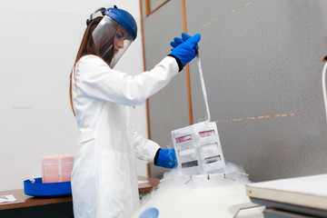 Woman working in a laboratory research