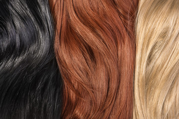 Long blond, black, red human shiny hair