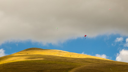 paraglider in the sky of italy