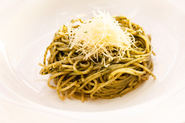 spaghetti mixed with pesto