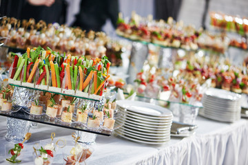 catering service table with food set