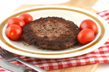 Freshly grilled hamburger patty