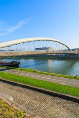 Bernatka bridge over Vistula river on sunny day, Krakow, Poland