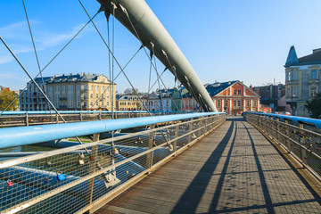 Naklejka premium Bernatka bridge over Vistula river on sunny day, Krakow, Poland
