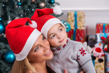 Mom and daughter preparing for Christmas