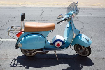 Foto op Plexiglas Light blue moped and helmet © Christine Bird