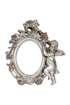 Oval baroque silver picture frame with cupid, clipping path.