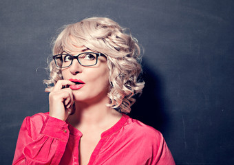 woman with glasses looking up - business rocks 11