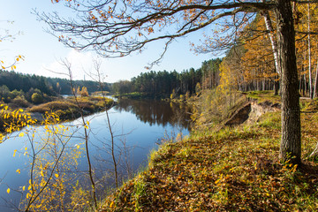 scenic autumn colored river in country