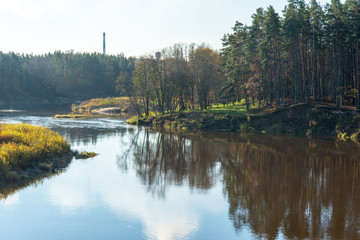 scenic autumn colored river in country