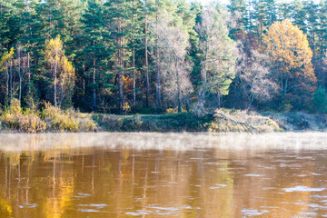 Fototapeta premium scenic autumn colored river in country