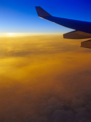 Fototapeta premium Sunset over a clouds.