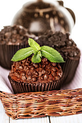 Homemade chocolate muffins in paper cupcake holder