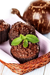 Homemade chocolate muffins in paper cupcake holder