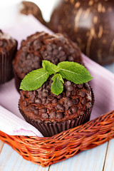 Homemade chocolate muffins in paper cupcake holder