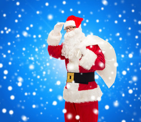 man in costume of santa claus with bag