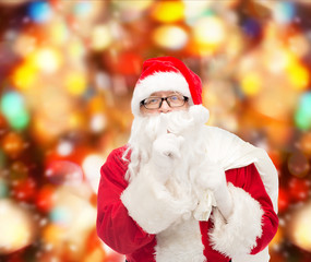 man in costume of santa claus with bag